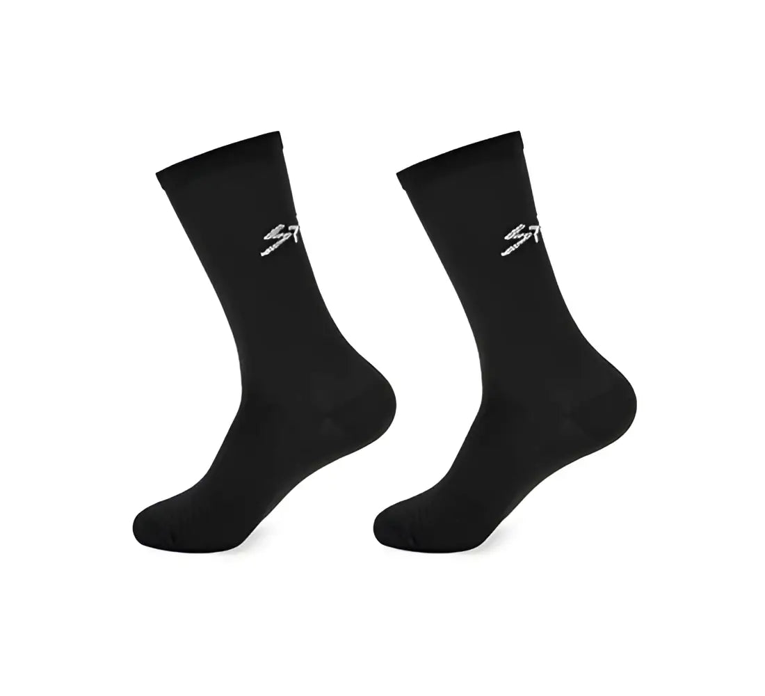 Calcetin ciclismo spiuk anatomic largo unisex negro con logo blanco sutil en el lateral pack 2 uds
