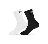 Calcetin ciclismo spiuk pack 2 uds anatomic medio unisex en blanco y negro con logo minimalista en el tobillo