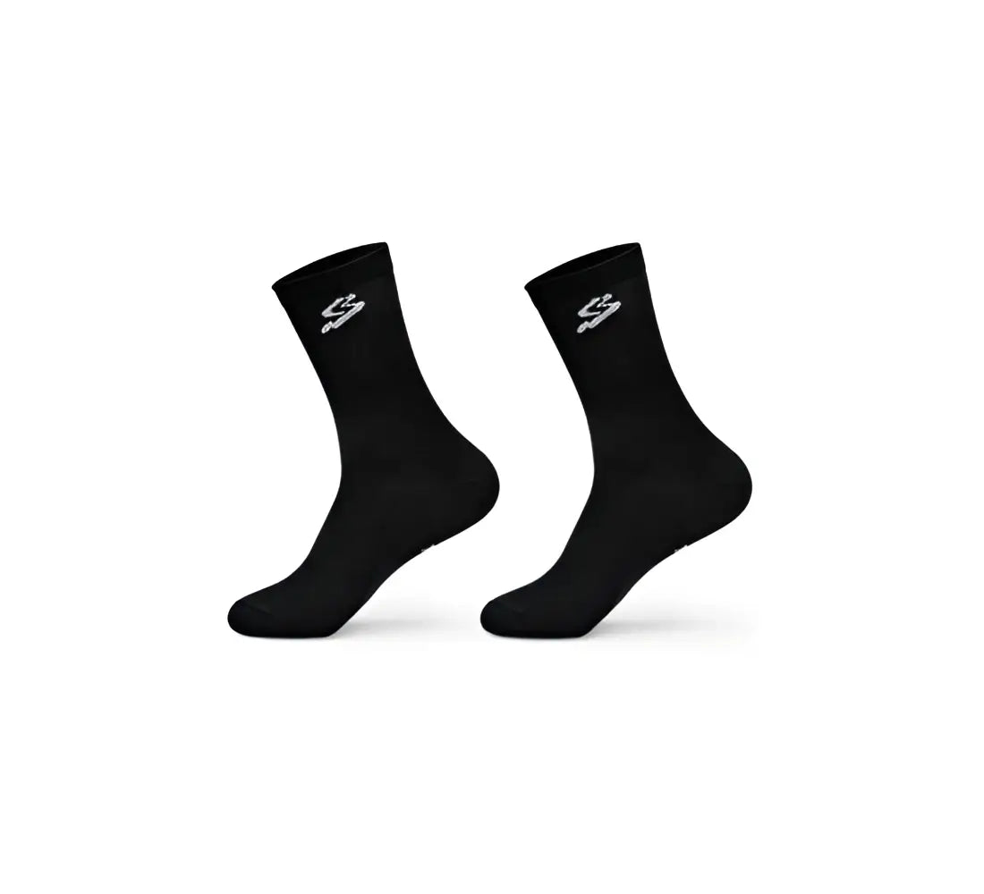 Calcetín ciclismo spiuk unisex negro con logo blanco discreto en el puño ideal para ciclismo profesional